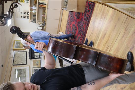 A 19th century cello with two-piece back and bow